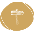 gezeichneter Wegweiser auf goldenem Kreis